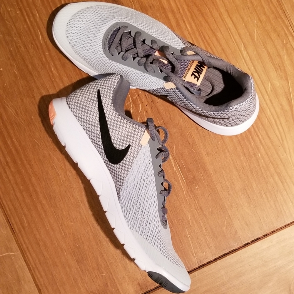 NIKE Tennis Shoes. White, Gray, Black, Pale Orange. Women's size 10. Never worn.